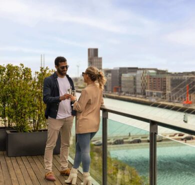 Couple Balcony Drinks Wide