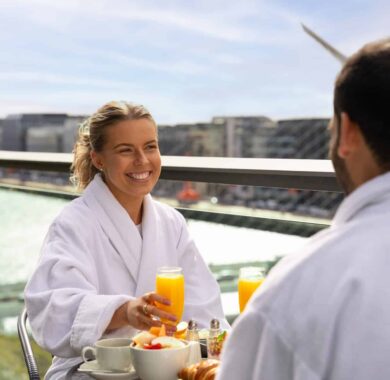 Couple On Balcony Breakfast Close