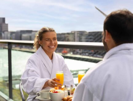 Couple On Balcony Breakfast Close