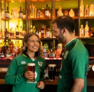 Rugby couple with drinks